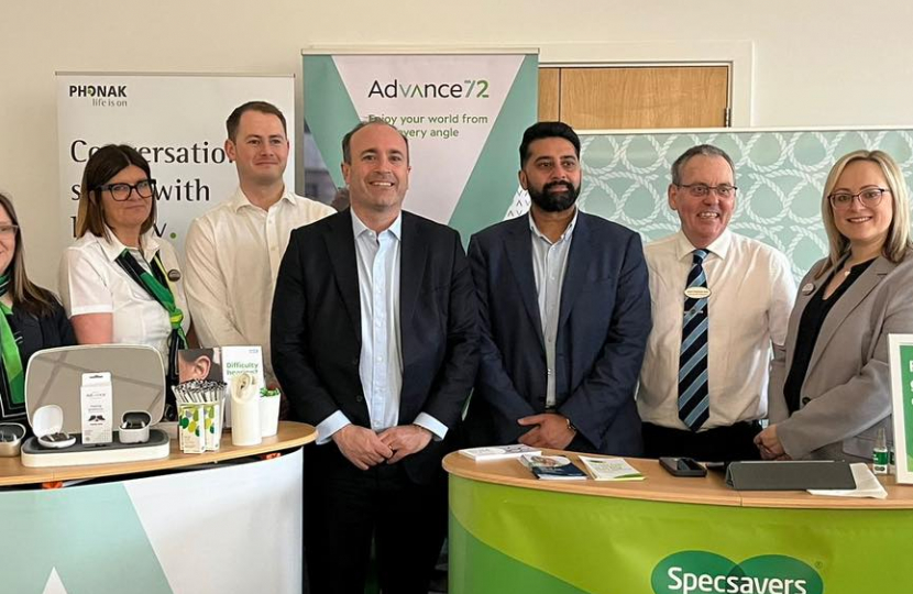 Aaron Bell MP with Specsavers