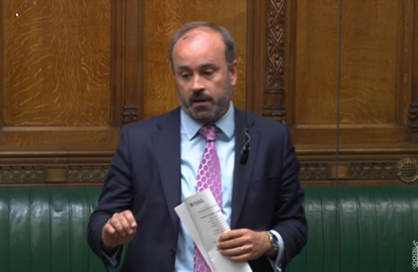 Aaron speaking in Parliament