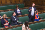 Aaron asking the Immigration Minister, Robert Jenrick a question in the Commons Chamber